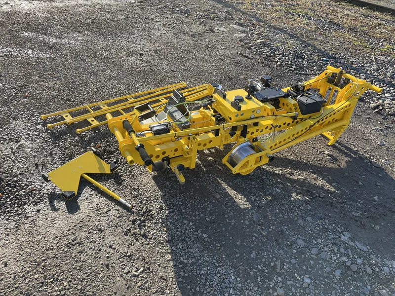 Folded and laid beside the track: despite its 110 kg the trolley comes apart for transport