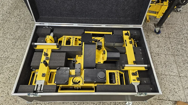 The whole system, dismantled, travels in one foam-lined flight case