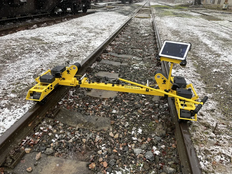Set up in a station yard in winter; the trolley is lifted off the track in seconds when traffic needs the line